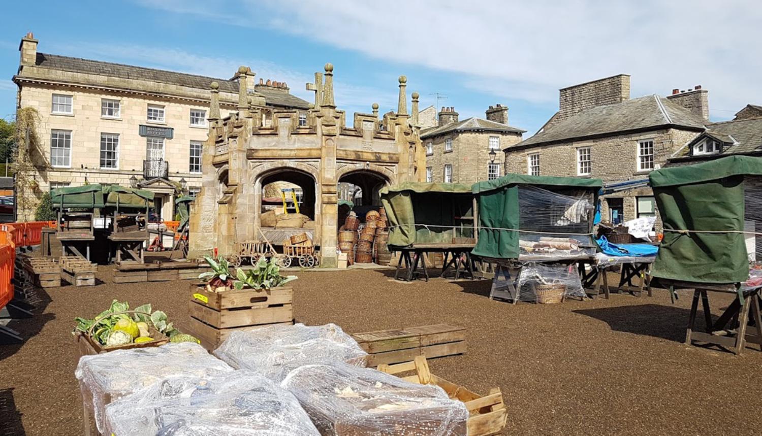 Unknown The monument in Market Square during the filming for Jamaica Inn